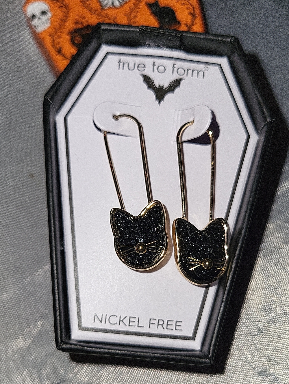 True To Form Cat earrings black gem detail golden tone